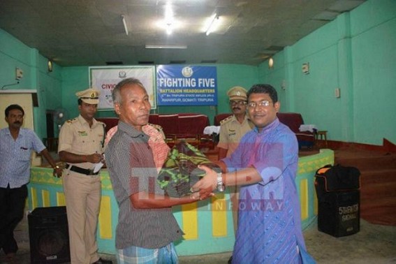 TSR 5th BTN distributes warm cloths to poor people on the eve of Durga Puja