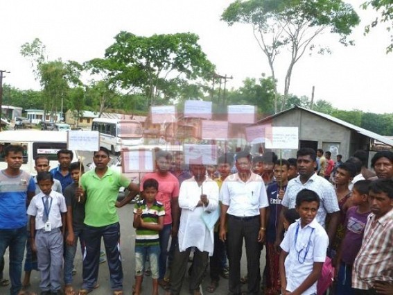 Locals block road