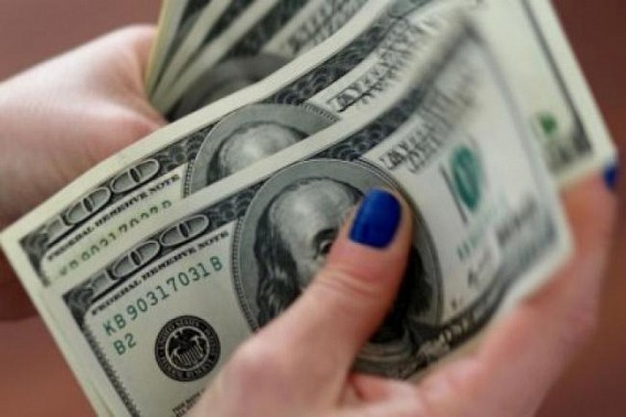China's yuan rises to 6.8854 against US dollar