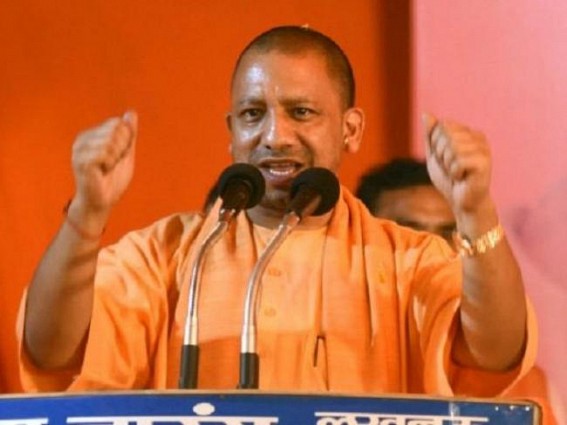 EC ban on, Yogi lands in Ayodhya, meets sants