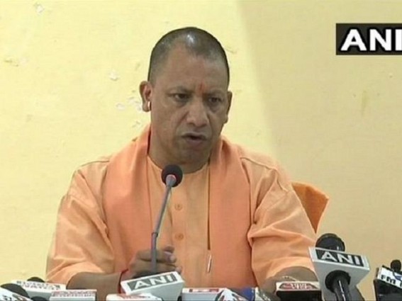 Yogi meets kin of dead cops, announces Rs 1-cr each to families