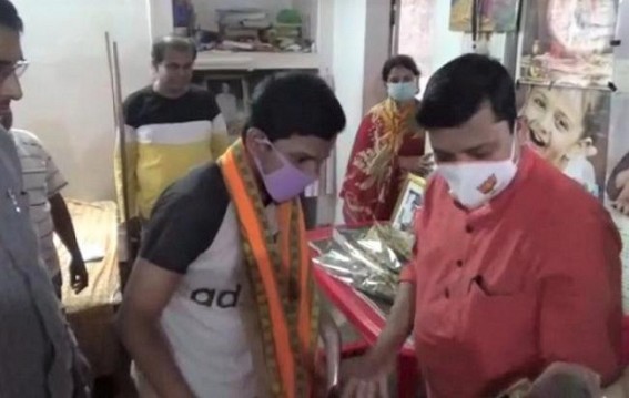 Yuba Morcha members felicitated TBSE Madhyamik topper Dipayan Debnath 