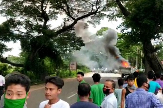 Tension erupted in Jirania: After a loading vehicle hits a bike, furious crowd allegedly burnt the vehicle 