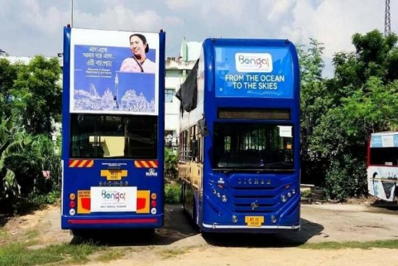 Mamata unveils double-decker open-roof buses in Kolkata