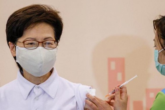 HK's Lam receives 2nd Covid shot