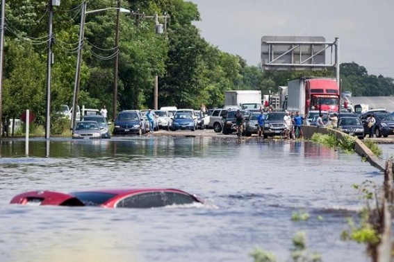 Recent flash floods, landslides clear sign of climate change: VP