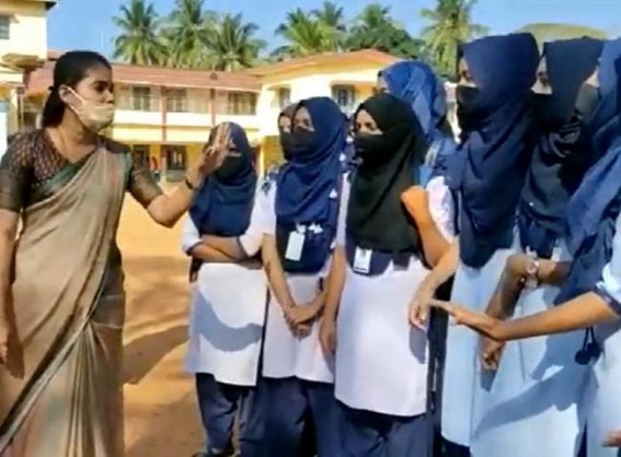 Hijab row: K'taka colleges reopen amid tight security