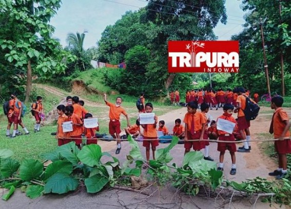 Students’ Protests Continue in Tripura against Teachers’ Crisis : Students of Rajnagar S.B. School in Sabroom Blocked Road in Protest against Teacher’s Transfer amid Shortages of Teachers