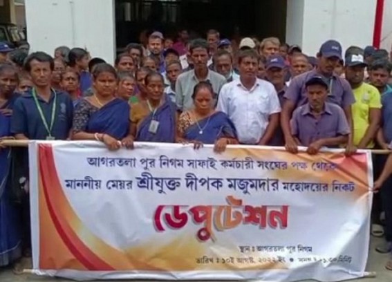 Demanding Salary hike, Job regularization AMC cleaning staff placed deputation to AMC Mayor
