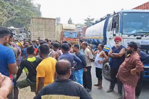 Truck Drivers Blocked Road protesting against delayed vehicle movement due to Checking