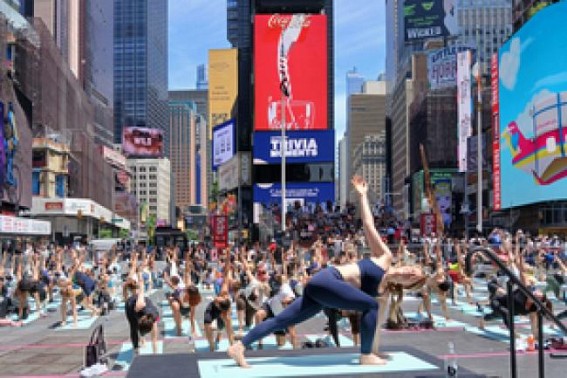 Yogis create island of stillness at New York's frenetic Times Square