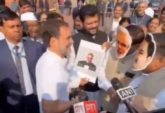 Congress MPs protest in Parliament with Modi and Adani masks