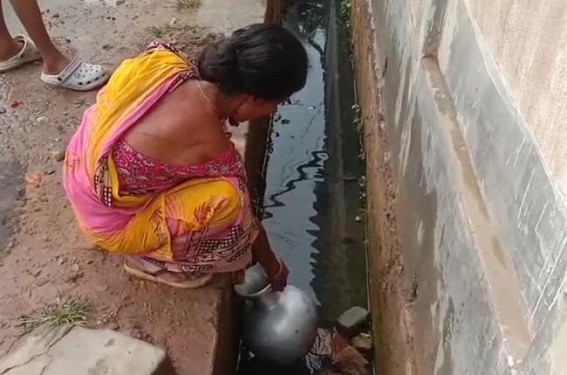 Public collecting water from Drain due to disruption in Water Supplies in Ward No-14, Kailashahar