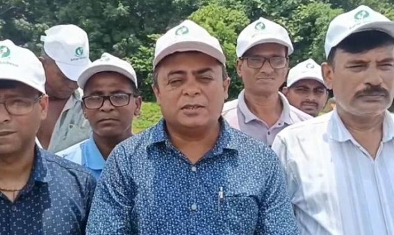 Agriculture Officials Plant High-Yielding Rice Saplings with Farmers