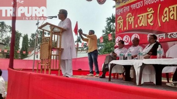 BJP, Cong came down heavily at Manik Sarkar for travelling in helicopter for election-campaigning 