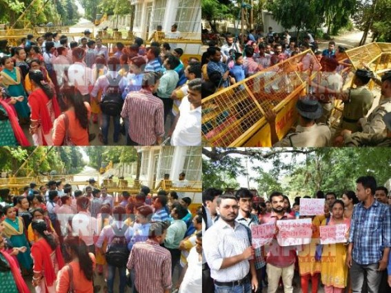 After 14000 teacher-posts announced, chaos in front of Tripura Education Minister's residence : Undergoing B.Ed students demand date extension of exam 