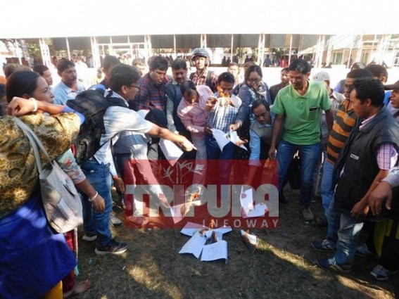 Tripura's terminated 10323 teachers burn their termination letters