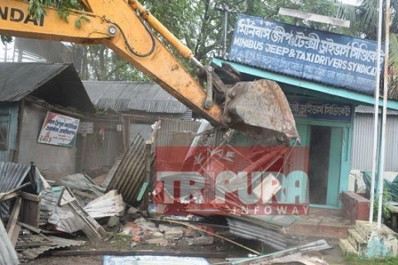 Tripuraâ€™s Party Offices demolition begins : Agartala Motor Stand's all party offices, small shops built over govt lands bulldozed