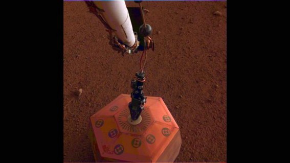 NASA's InSight lander places first instrument on Mars