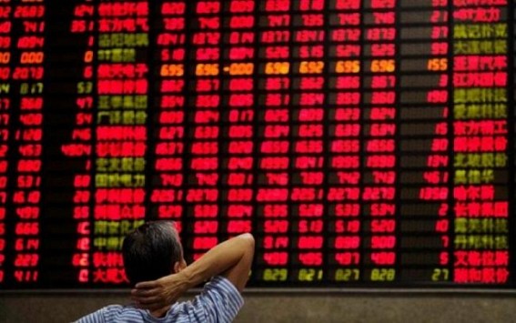 Chinese shares open higher; yuan weakens