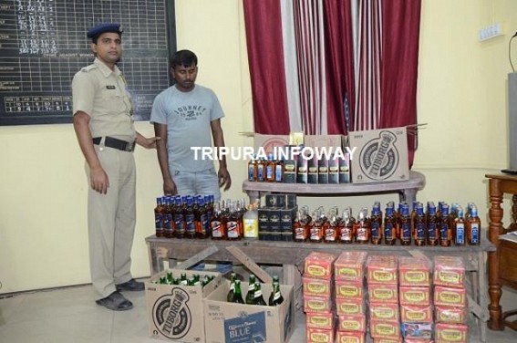 Auto driver  caught red-handed with above 200 liquor bottles