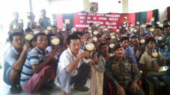 Assam Rifles distributes solar lamps to villagers in Gandacherra