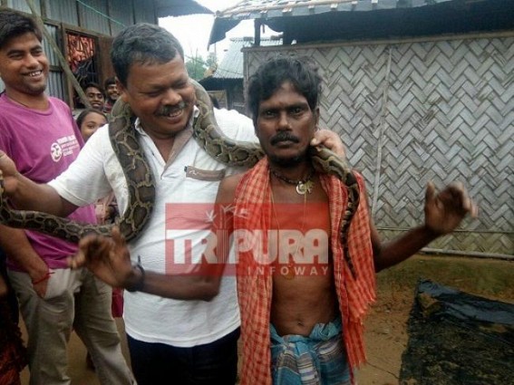 Python recovered by villagers while fishing