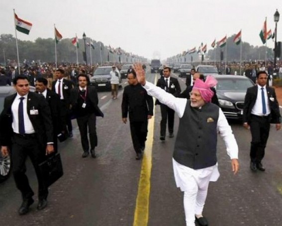 Breaking protocol again, Modi walks on Rajpath