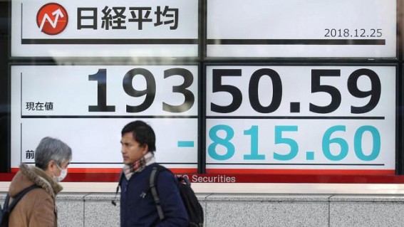 Japan's Nikkei rises on strong Wall Street