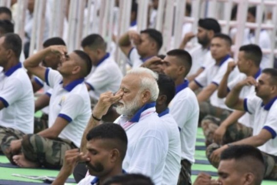 Yoga hasn't reached poor, tribals: Modi 