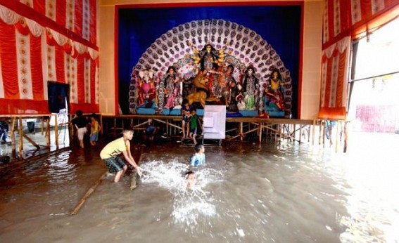 Heavy rains across Bengal hit Durga puja preparations