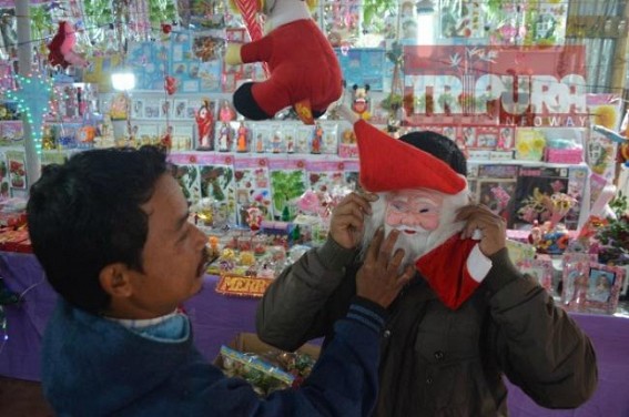 Agartala markets glittering ahead of X-Mas with Santa Clauses, masks, stars, trees