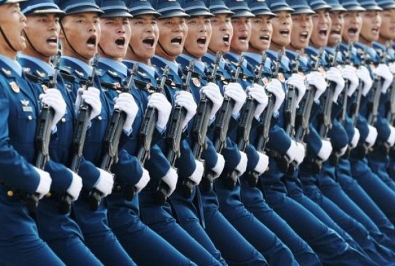 As world fights corona, China flexes its military muscle 