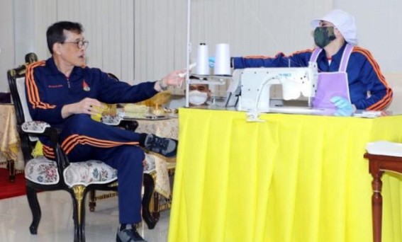 Thai King, Queen inspect soldiers manufacturing COVID-19 supplies