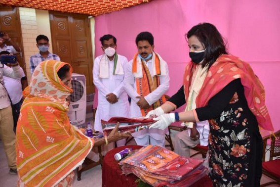 On the eve of Eid, Niti Deb distributes cloths among needy people