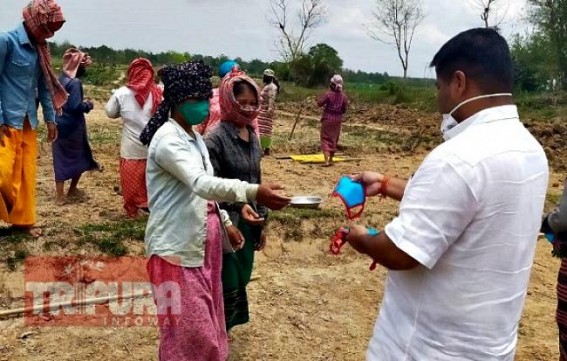 MLA Sushanta Chowdhury distributed masks among 500 MGNREGA card holders as State resumes MGNREGA works