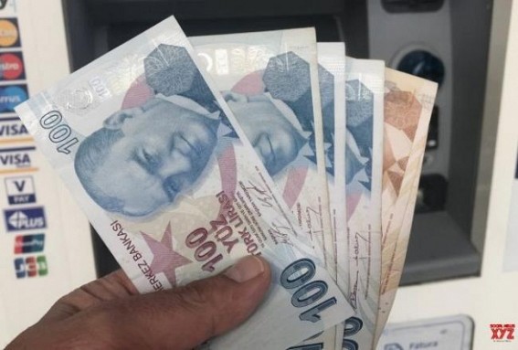 Turkish lira tumbles after sacking of central bank head