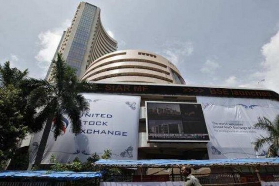 Sensex surges nearly 600 points to end at record closing level