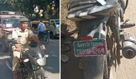 Forest Dept Officer spotted riding bike without a helmet on Teliamura road