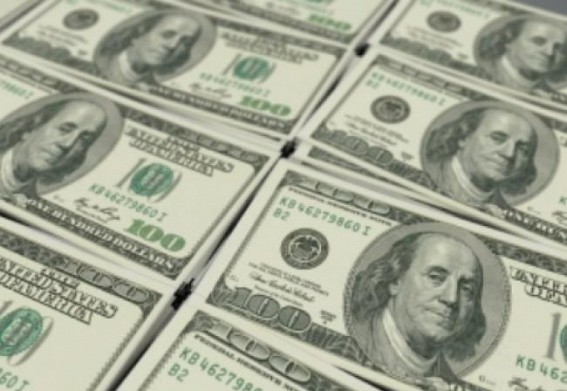 US sees dollar bruised around the world, but not beaten
