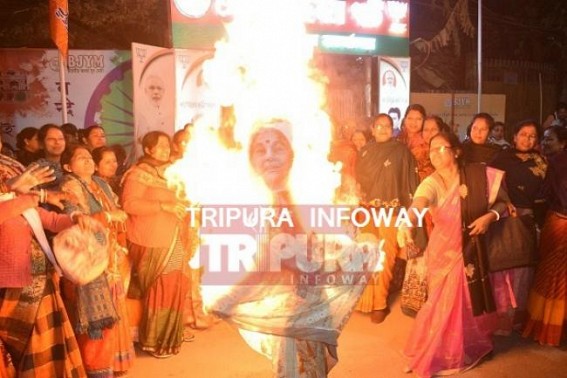 BJP's women wing burns CPI-M woman leader's effigy for calling 'PM' as 'Pocket-Mar' BJP's women wing burns CPI-M woman leader's effigy for calling 'PM' as 'Pocket-Mar'