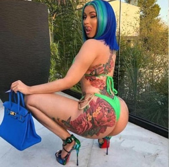 Cardi B flaunts massive colourful back tattoo