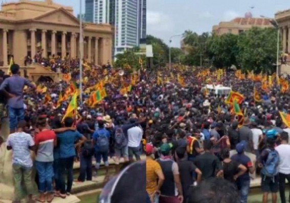 SL PM summons emergency meeting as protesters storm President's house SL PM summons emergency meeting as protesters storm President's house