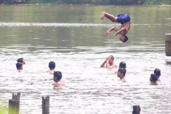 Summer waves hit normal lives in Tripura Summer waves hit normal lives in Tripura