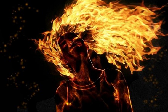 Parents set fire on two daughters, 1 critical Parents set fire on two daughters, 1 critical