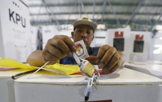 Indonesia goes to polls to elect new President Indonesia goes to polls to elect new President