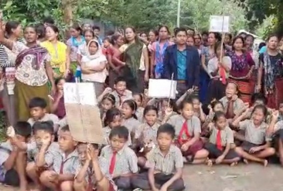Along with villagers, students blocked Road demanding 'Road Repairing' Along with villagers, students blocked Road demanding 'Road Repairing'
