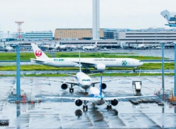 2 passenger planes collide at Tokyo airport 2 passenger planes collide at Tokyo airport