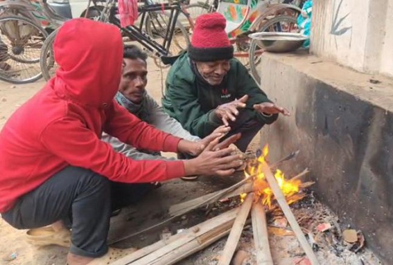 Warming Up with Firewoods in Agartala Street Corners as Cold Waves hit Warming Up with Firewoods in Agartala Street Corners as Cold Waves hit